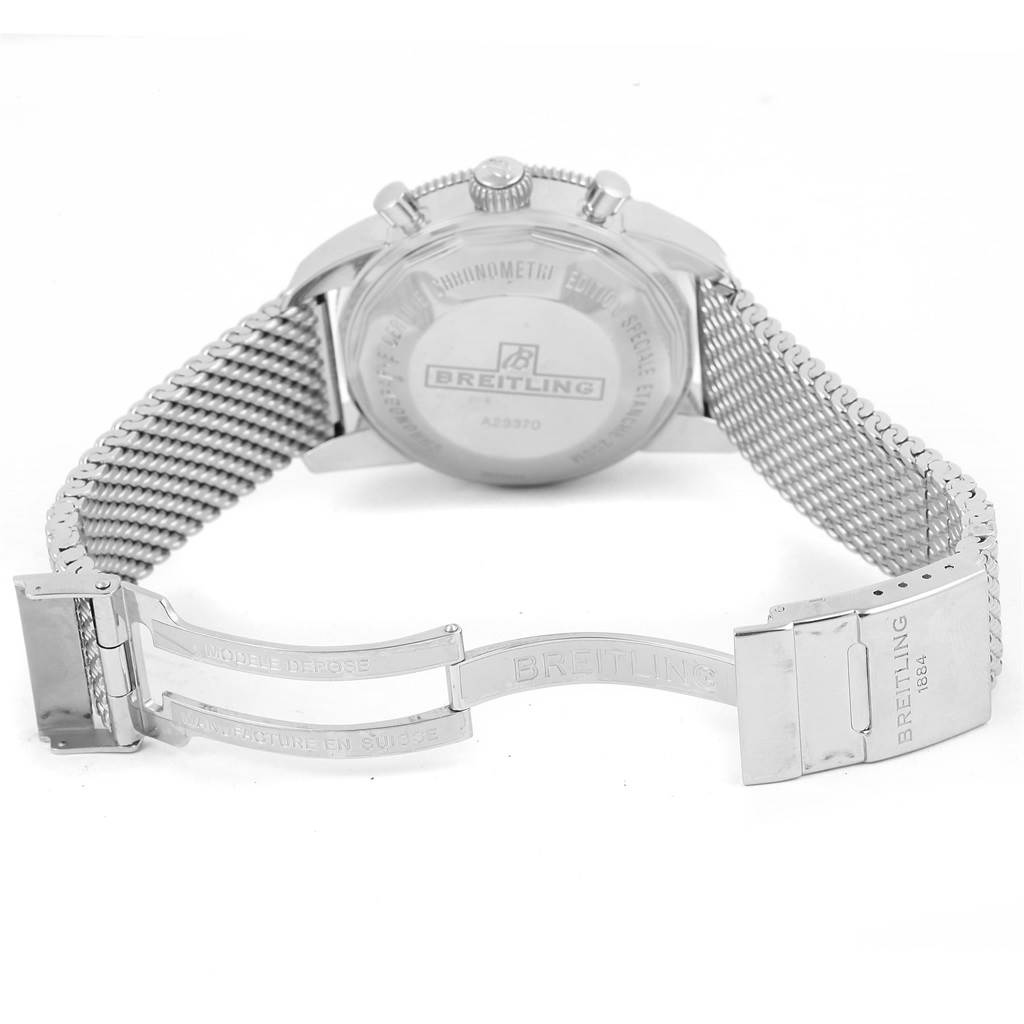 The image shows the backside and clasp of the Breitling Superocean A23370 Men's Stainless Steel Blue Dial A23370 Men's Stainless Steel Blue Dial watch, including its metal mesh strap and engraved case back.