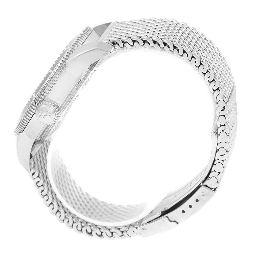 The image shows the side view of a Breitling Superocean A17321 Men's Stainless Steel Black Dial A17321 Men's Stainless Steel Black Dial watch, highlighting its metal mesh strap and crown.