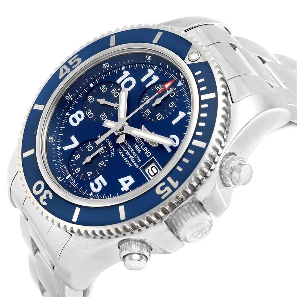 The Breitling Superocean A13311 Men's Stainless Steel Blue Dial A13311 Men's Stainless Steel Blue Dial watch is shown at an angle highlighting the blue dial, bezel, pushers, crown, and part of the metal bracelet.