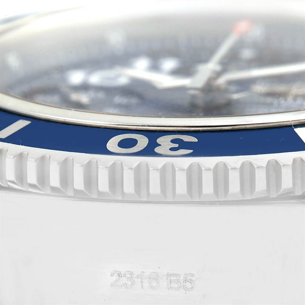 The image shows a close-up side view of the bezel and part of the face of the Breitling Superocean A13311 Men's Stainless Steel Blue Dial A13311 Men's Stainless Steel Blue Dial watch.