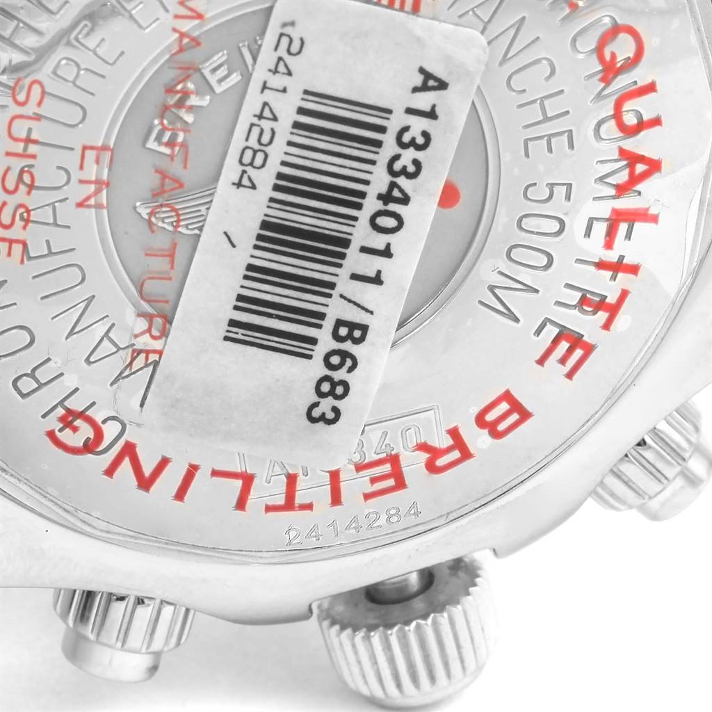 The image shows the back case and crown of a Breitling Superocean A13340 Men's Stainless Steel Black Dial A13340 Men's Stainless Steel Black Dial watch with a barcode sticker.