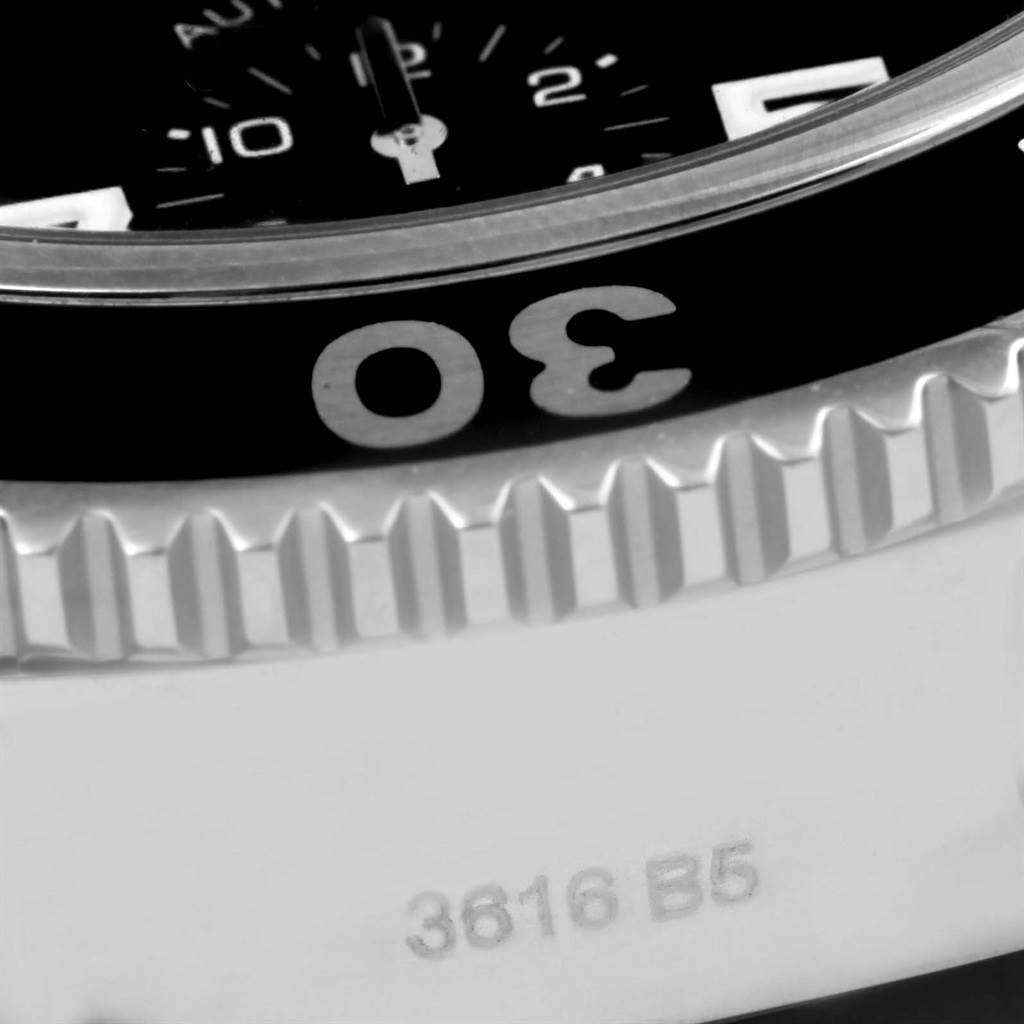 The image shows a close-up of the bezel and part of the dial of a Breitling Superocean A13311 Men's Stainless Steel Black Dial A13311 Men's Stainless Steel Black Dial watch, emphasizing the number 30.
