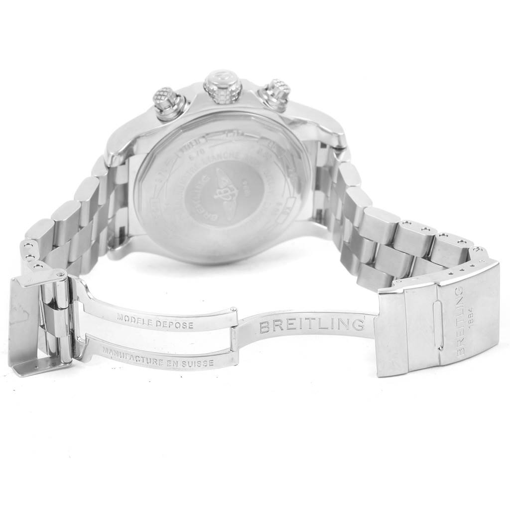 The image shows the back of a Breitling Avenger A13370 Men's Stainless Steel Blue Dial A13370 Men's Stainless Steel Blue Dial watch and its open metal bracelet clasp, displaying the brand name.