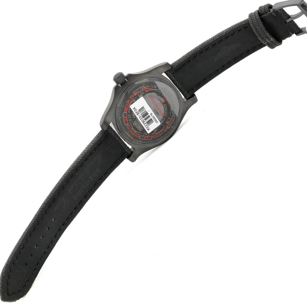 The image shows the back view of a Breitling Avenger M32390 Men's Stainless Steel Black Dial M32390 Men's Stainless Steel Black Dial watch, featuring its case back and black leather strap.