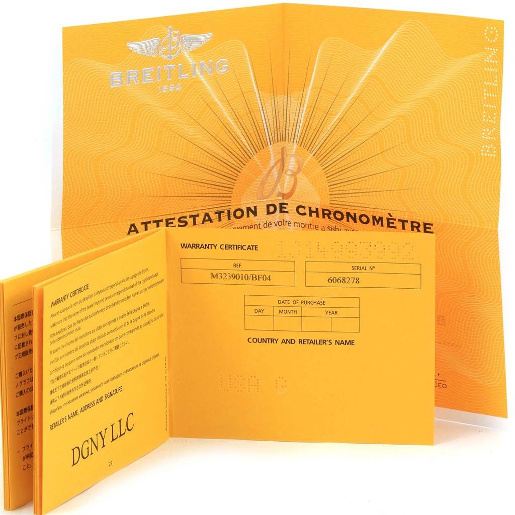 The image shows the warranty certificate and chronometer attestation for the Breitling Avenger M32390 Men's Stainless Steel Black Dial M32390 Men's Stainless Steel Black Dial model watch.