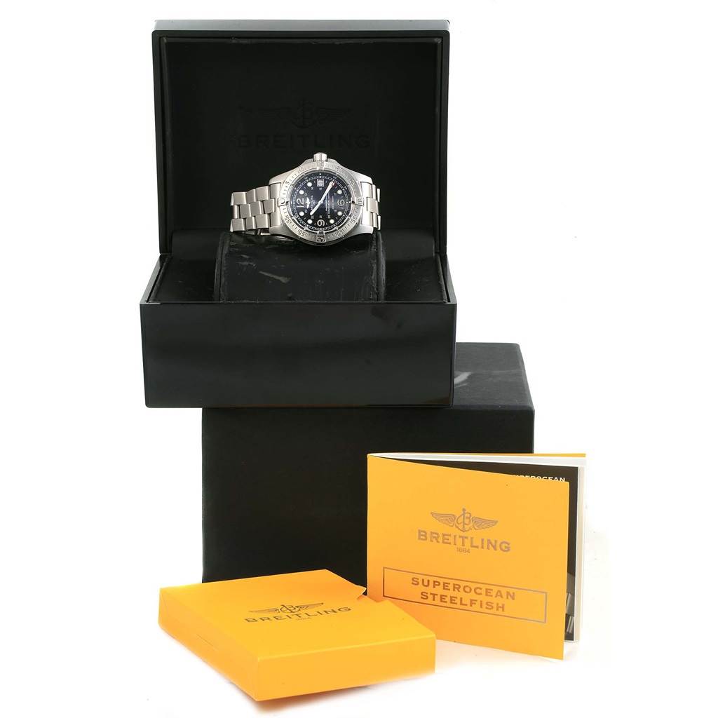 The Breitling Superocean A17390 Men's Stainless Steel Black Dial A17390 Men's Stainless Steel Black Dial watch is displayed frontally in its box, along with manuals and packaging.