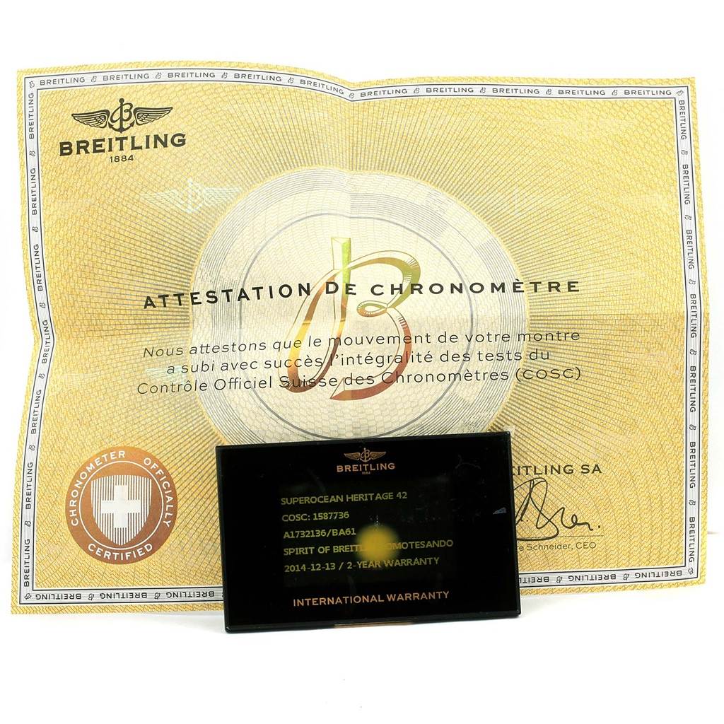 The image shows the warranty card and chronometer certification for the Breitling Superocean A17321 Men's Stainless Steel Black Dial A17321 Men's Stainless Steel Black Dial Heritage 42 watch.
