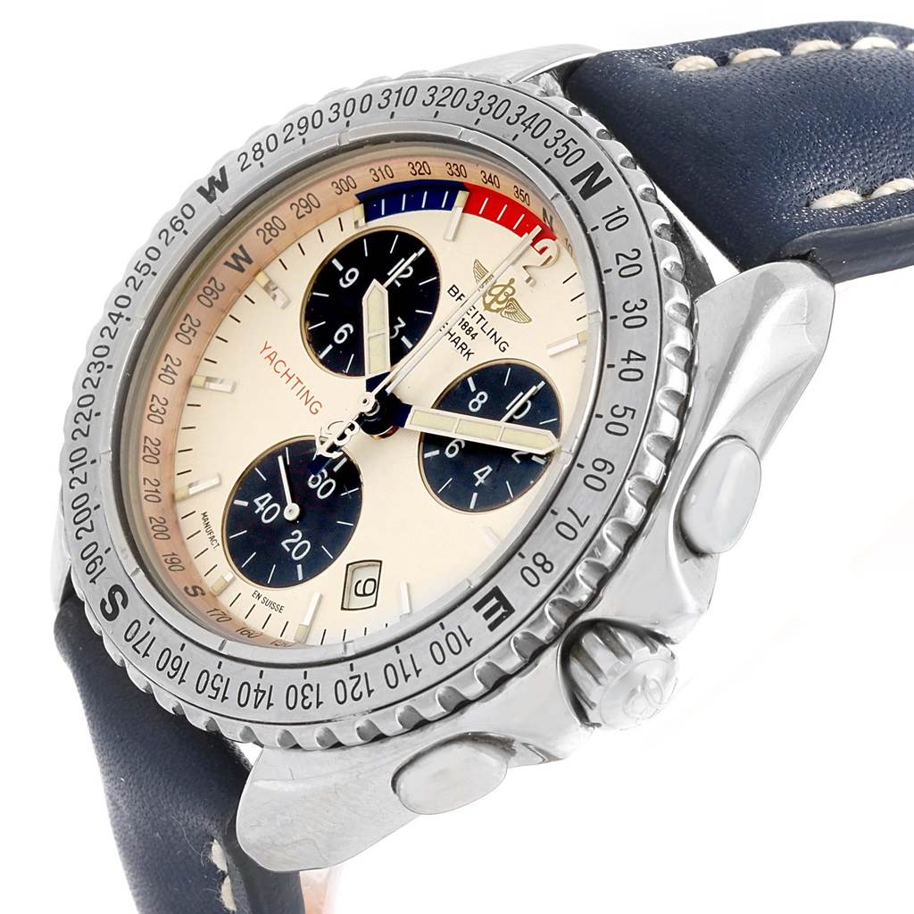 This image shows a Breitling Superocean A53605 Men's Stainless Steel Silver Dial A53605 Men's Stainless Steel Silver Dial watch at a side angle, detailing its bezel, dial, pushers, and leather strap.