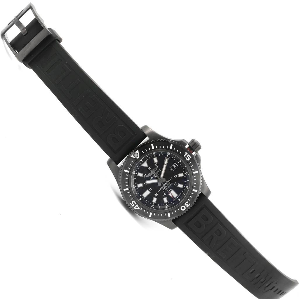 The Superocean watch by Breitling is shown at a slight angle, featuring the face, bezel, crown, and rubber strap.