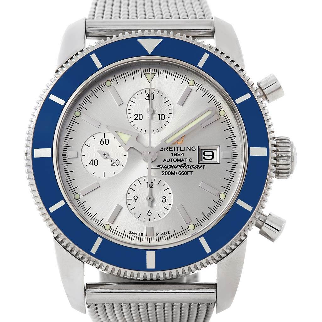This image shows a front view of a Breitling Superocean A13320 Men's Stainless Steel Silver Dial A13320 Men's Stainless Steel Silver Dial watch, highlighting its silver dial, blue bezel, and mesh bracelet.