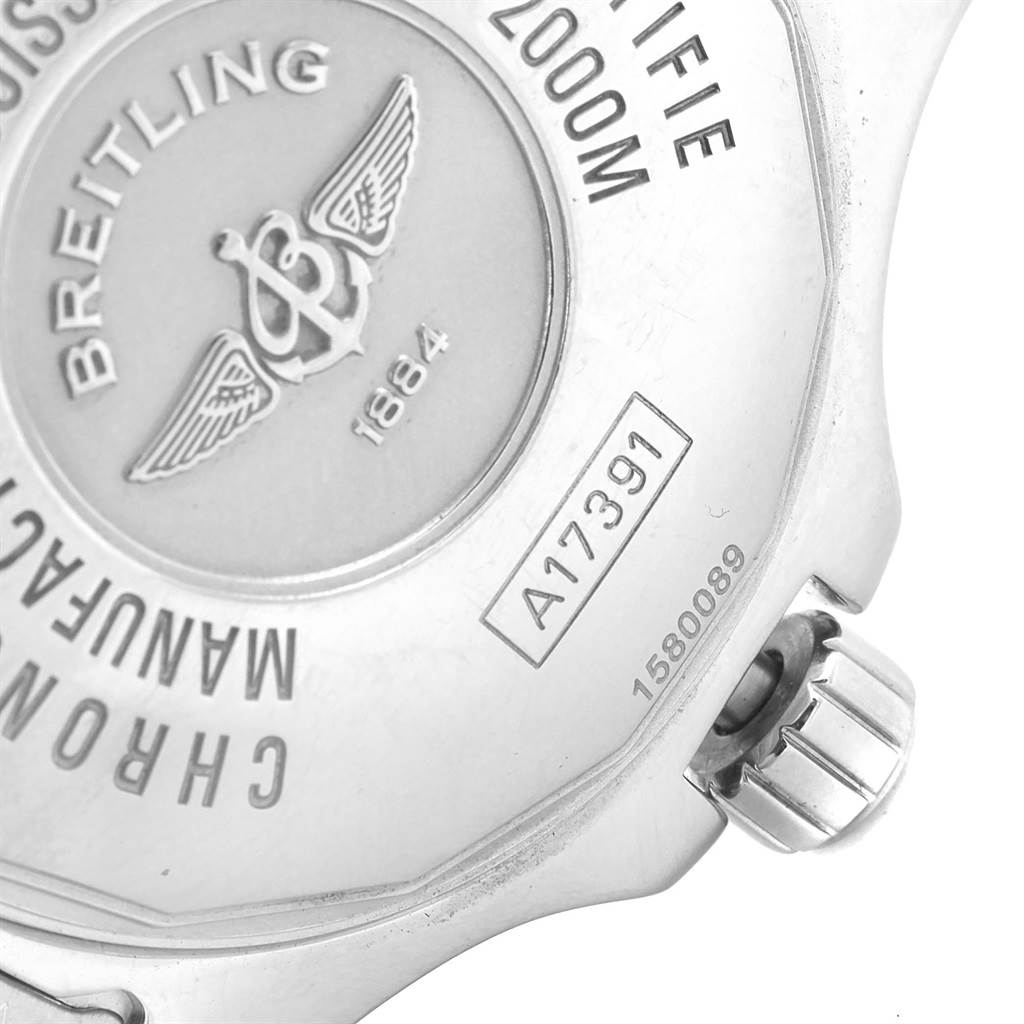 The image shows the back of the Breitling Superocean A17391 Men's Stainless Steel Black Dial A17391 Men's Stainless Steel Black Dial watch, focusing on the engraved logo, model details, and part of the crown.