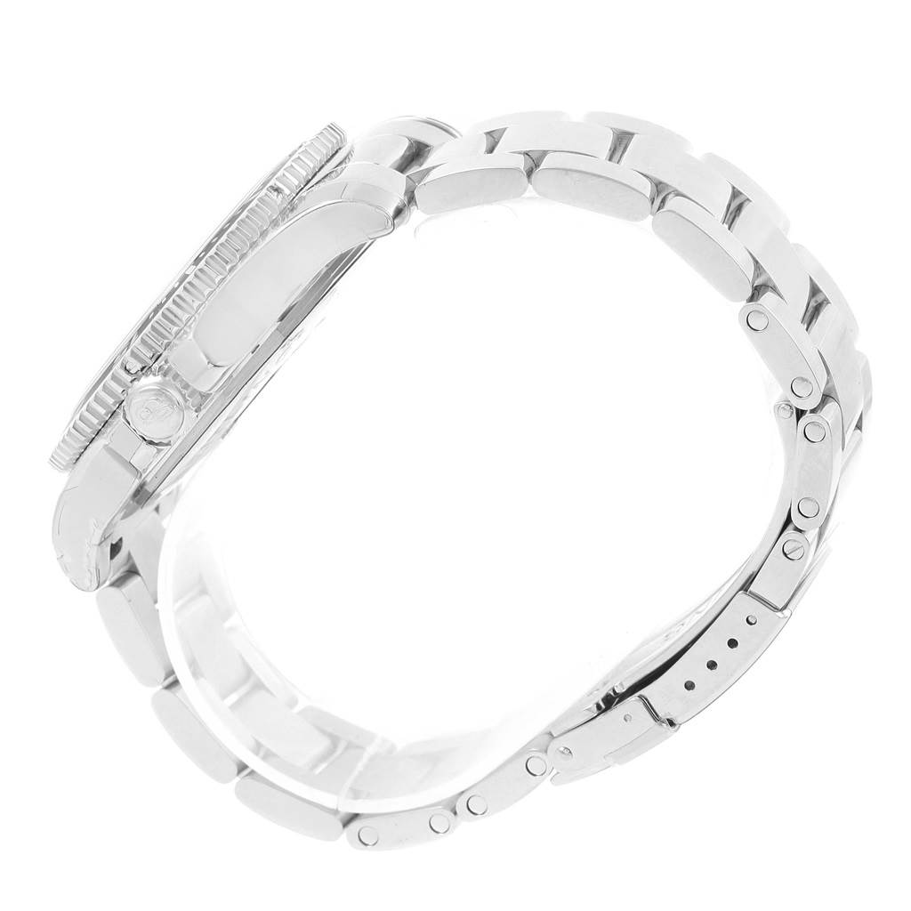 The image shows a side profile of a Breitling Superocean A17365 Men's Stainless Steel Blue Dial A17365 Men's Stainless Steel Blue Dial watch, highlighting its bezel, crown, and metal bracelet.