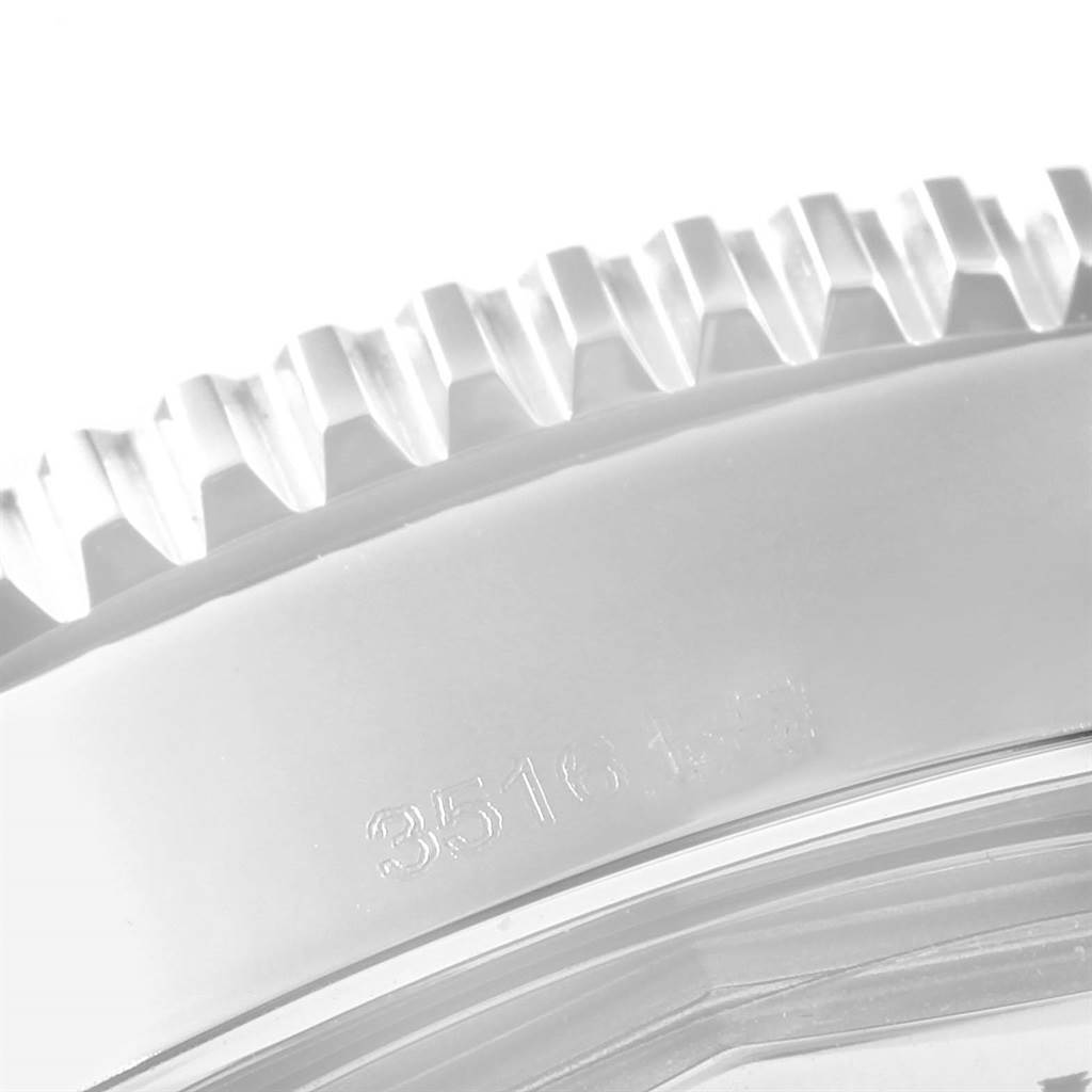 The image shows a close-up of the bezel and part of the casing of the Breitling Superocean A17365 Men's Stainless Steel Blue Dial A17365 Men's Stainless Steel Blue Dial watch.