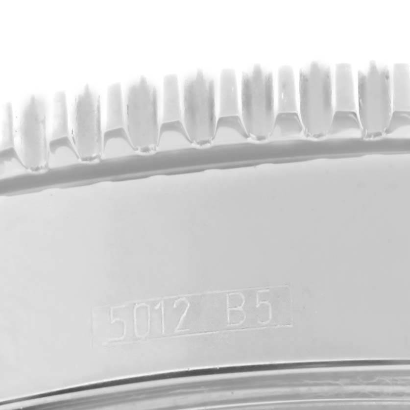 This image shows a close-up of the bezel with its engraving on a Breitling Superocean A17364 Men's Stainless Steel Black Dial A17364 Men's Stainless Steel Black Dial watch.