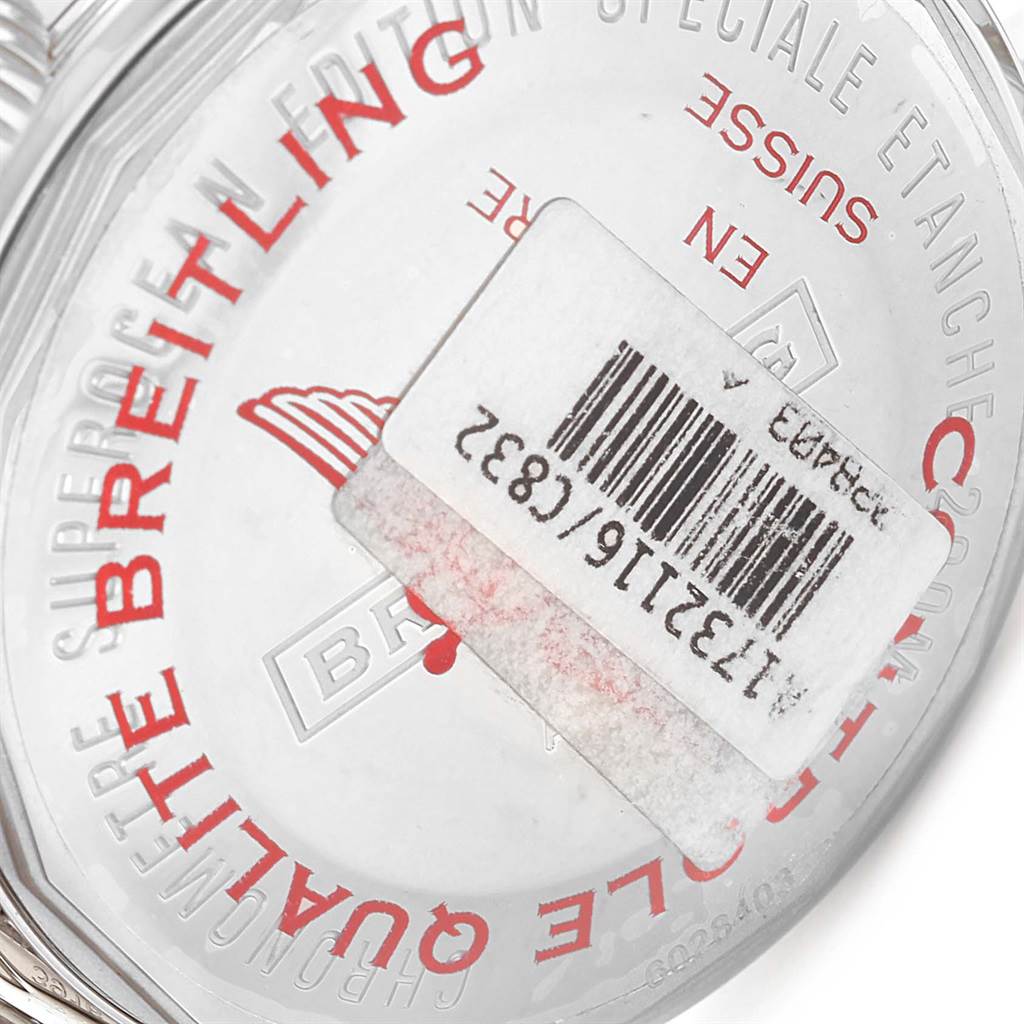 The image shows the back case of a Breitling Superocean A17321 Men's Stainless Steel Blue Dial A17321 Men's Stainless Steel Blue Dial watch, displaying engraved text and a barcode sticker.