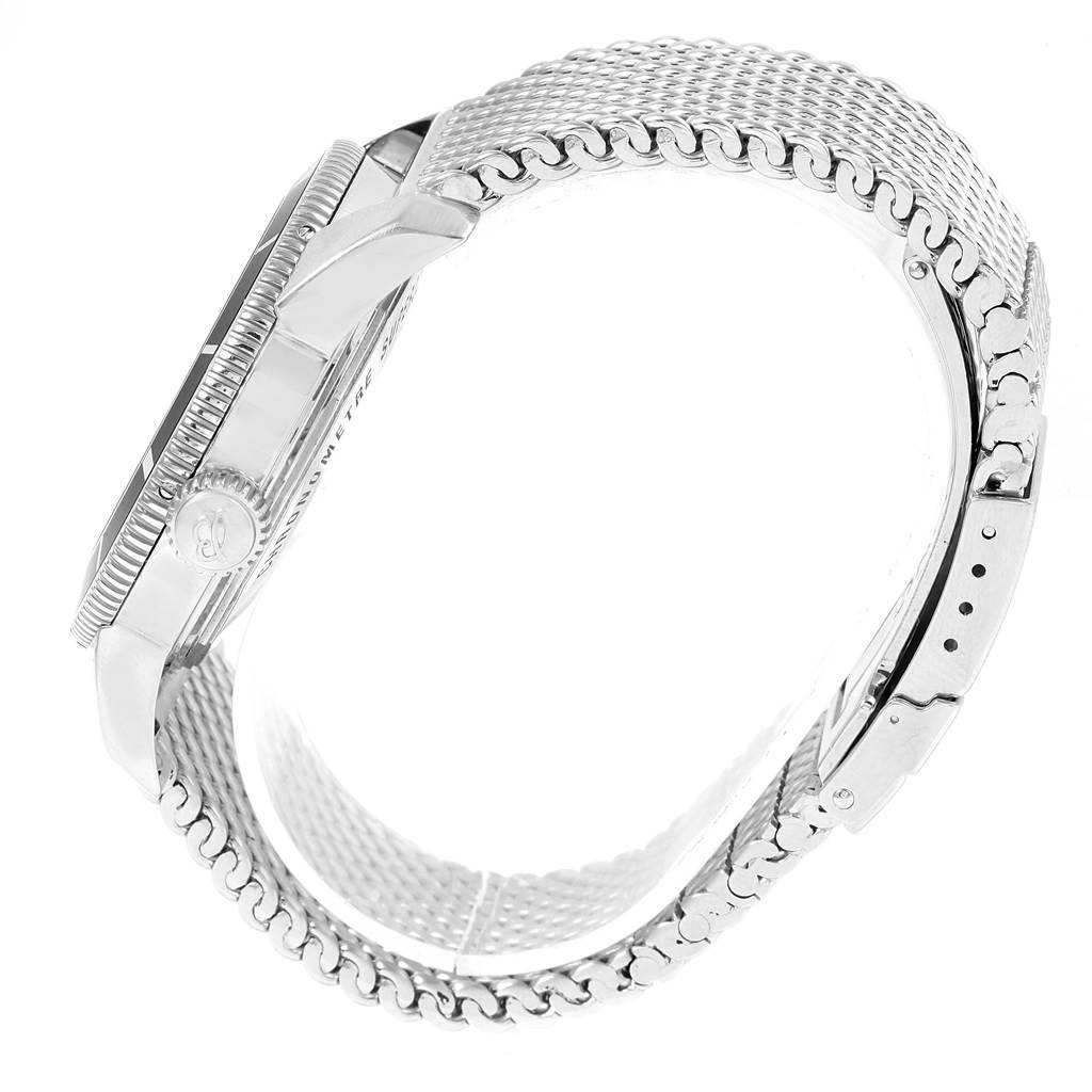 This image shows a Breitling Superocean A17321 Men's Stainless Steel White Dial A17321 Men's Stainless Steel White Dial watch from the side, highlighting the crown and metal bracelet.