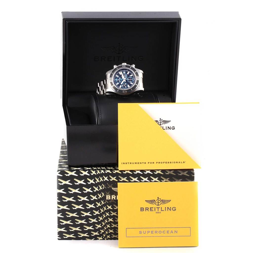 The image shows a Breitling Superocean A13341 Men's Stainless Steel Black Dial A13341 Men's Stainless Steel Black Dial watch displayed in its box, with accompanying branding and manuals in the foreground.