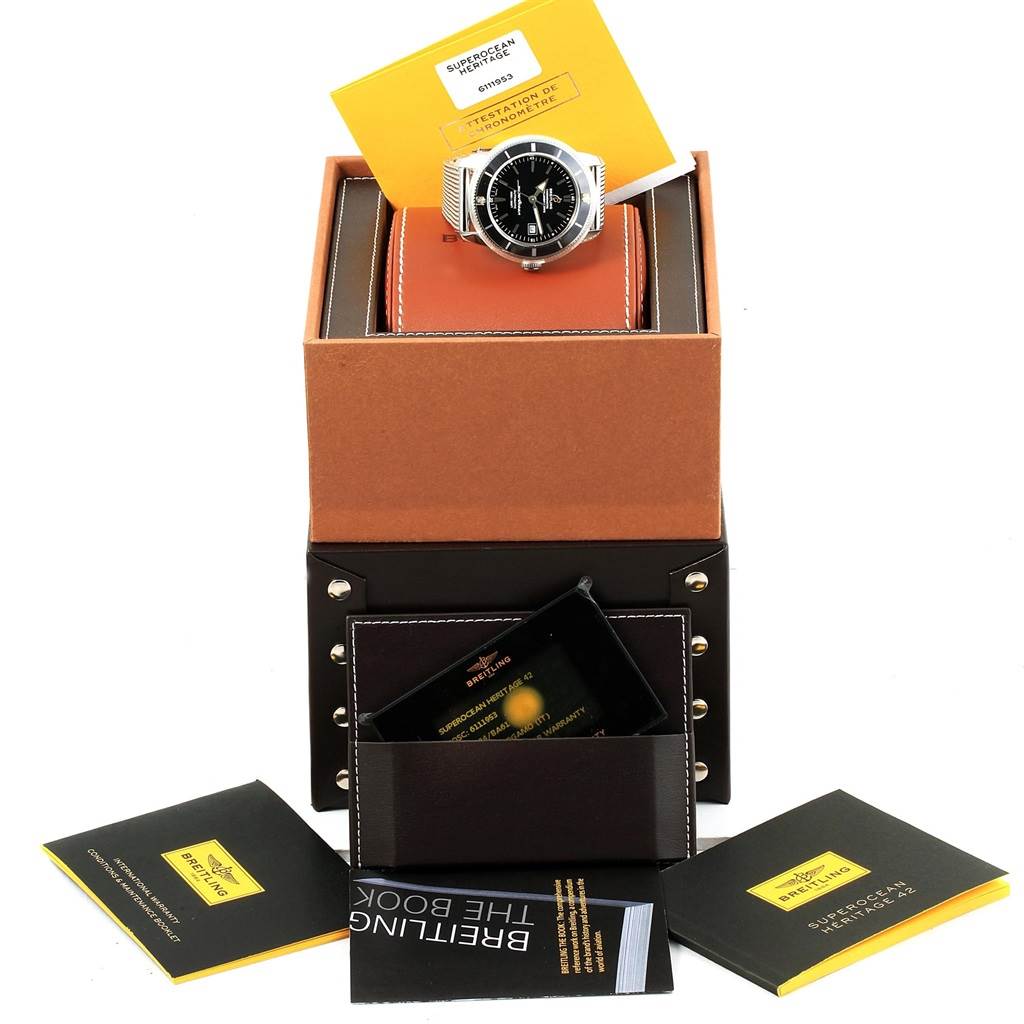 The Breitling Superocean A17321 Men's Stainless Steel Black Dial A17321 Men's Stainless Steel Black Dial watch is displayed on a cushioned holder with its paperwork and accessories, viewed from a front angle.