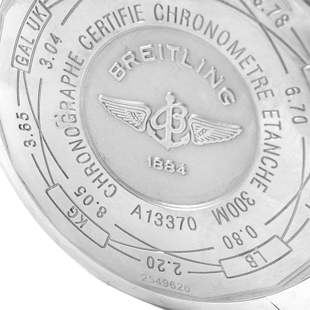 The image shows the back case of a Breitling Avenger A13370 Men
s Stainless Steel Black Dial A13370 Men
s Stainless Steel Black Dial watch, showcasing model and certification details.