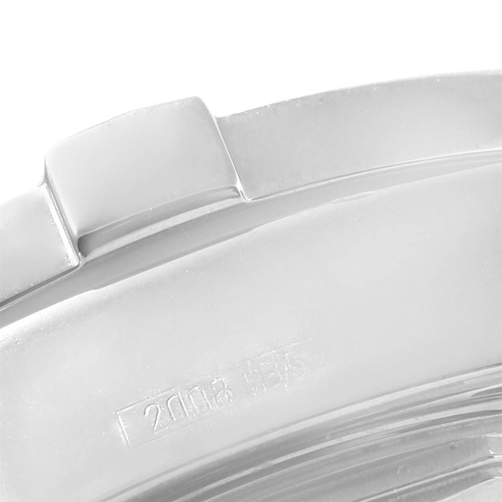 The image shows a close-up of the bezel and part of the dial of a Superocean watch by Breitling.