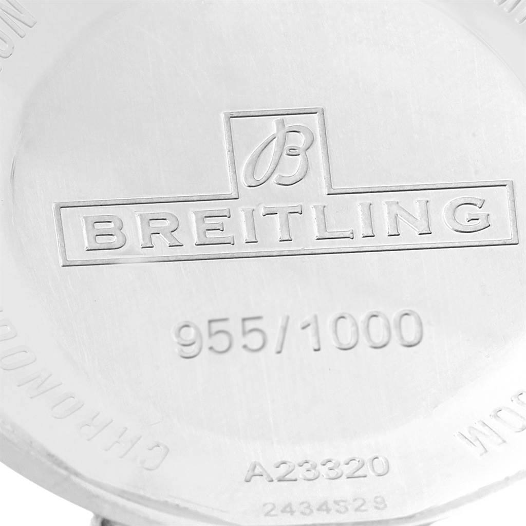 The image shows the backside of a Breitling Superocean A23320 Men's Stainless Steel Blue Dial A23320 Men's Stainless Steel Blue Dial watch, displaying the engraved logo and serial number.
