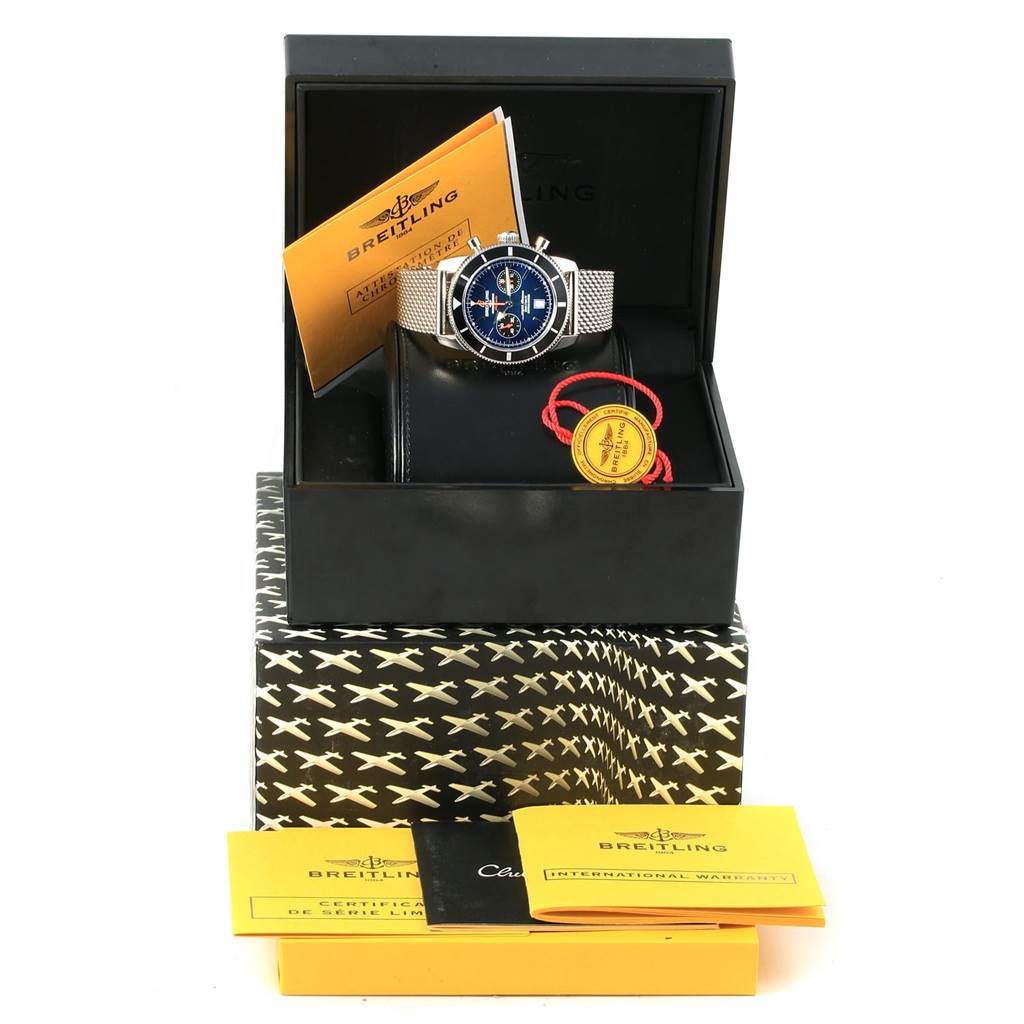 The Breitling Superocean A23320 Men's Stainless Steel Blue Dial A23320 Men's Stainless Steel Blue Dial watch is displayed at a front angle in its box, accompanied by paperwork and a tag.