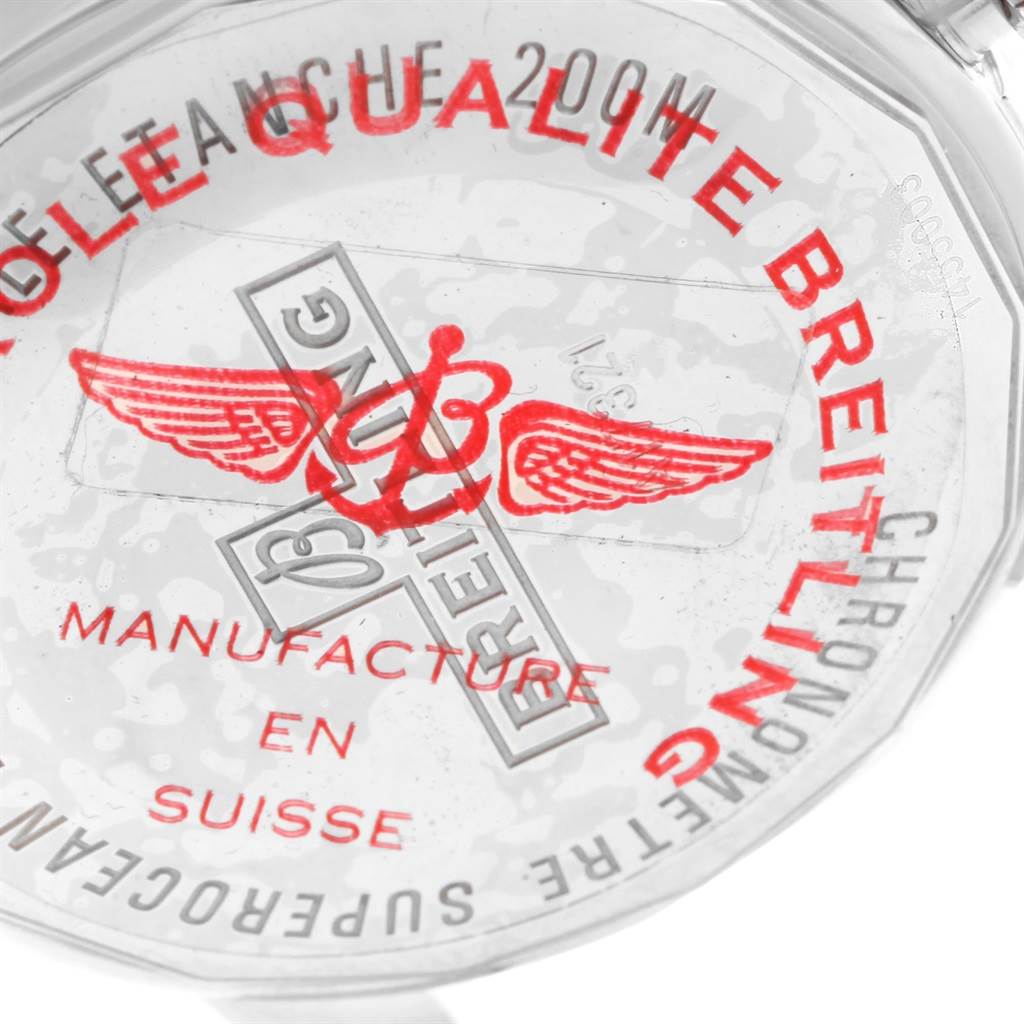 The image shows the backside of a Breitling Superocean A17321 Men's Stainless Steel Blue Dial A17321 Men's Stainless Steel Blue Dial watch, featuring branding and specifications in red text.