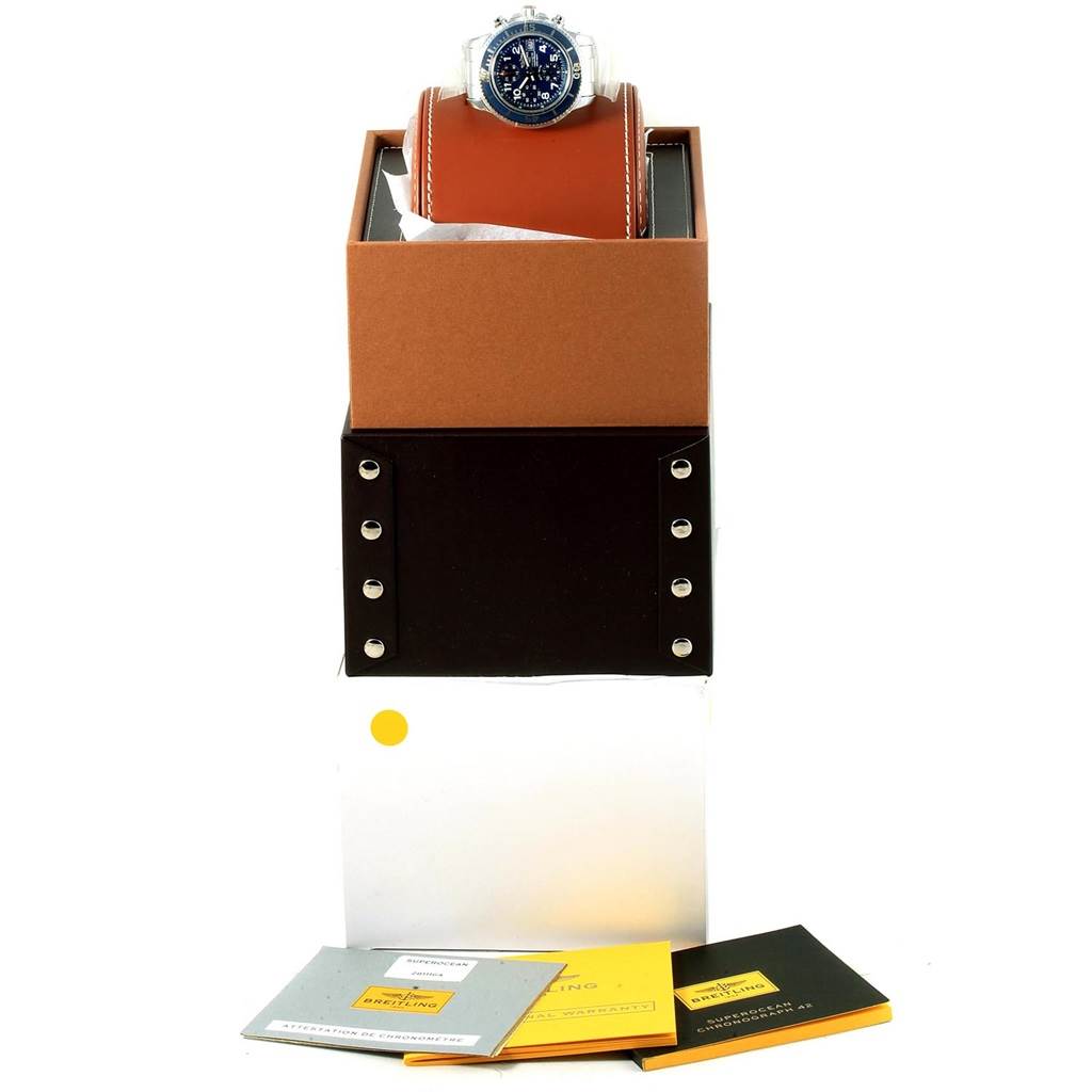 The Breitling Superocean A13311 Men's Stainless Steel Blue Dial A13311 Men's Stainless Steel Blue Dial watch is shown from the front, along with its leather watch holder, box, and documentation.