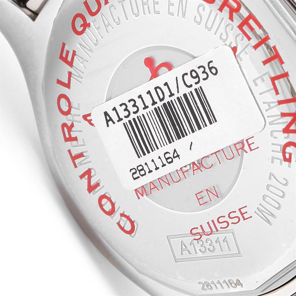 This image shows the back casing of the Breitling Superocean A13311 Men's Stainless Steel Blue Dial A13311 Men's Stainless Steel Blue Dial watch, featuring model details and a barcode sticker.