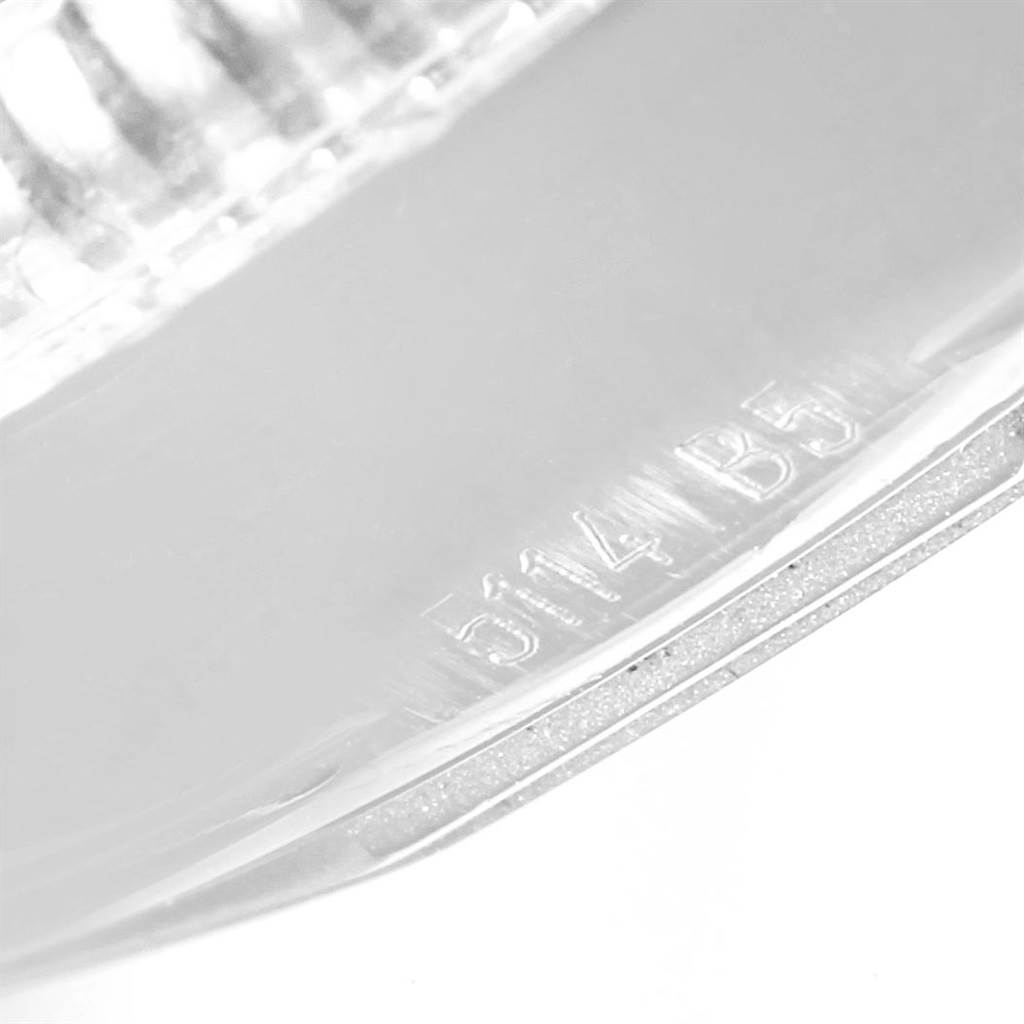 This close-up image of a Breitling Superocean A17321 Men's Stainless Steel White Dial A17321 Men's Stainless Steel White Dial model watch shows the engraved serial number.