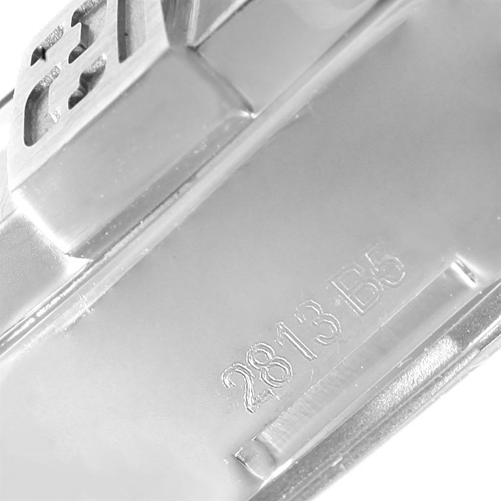 The image shows a close-up of a metal clasp with engraved numbers on a Breitling Avenger A32390 Men's Stainless Steel Black Dial A32390 Men's Stainless Steel Black Dial watch.