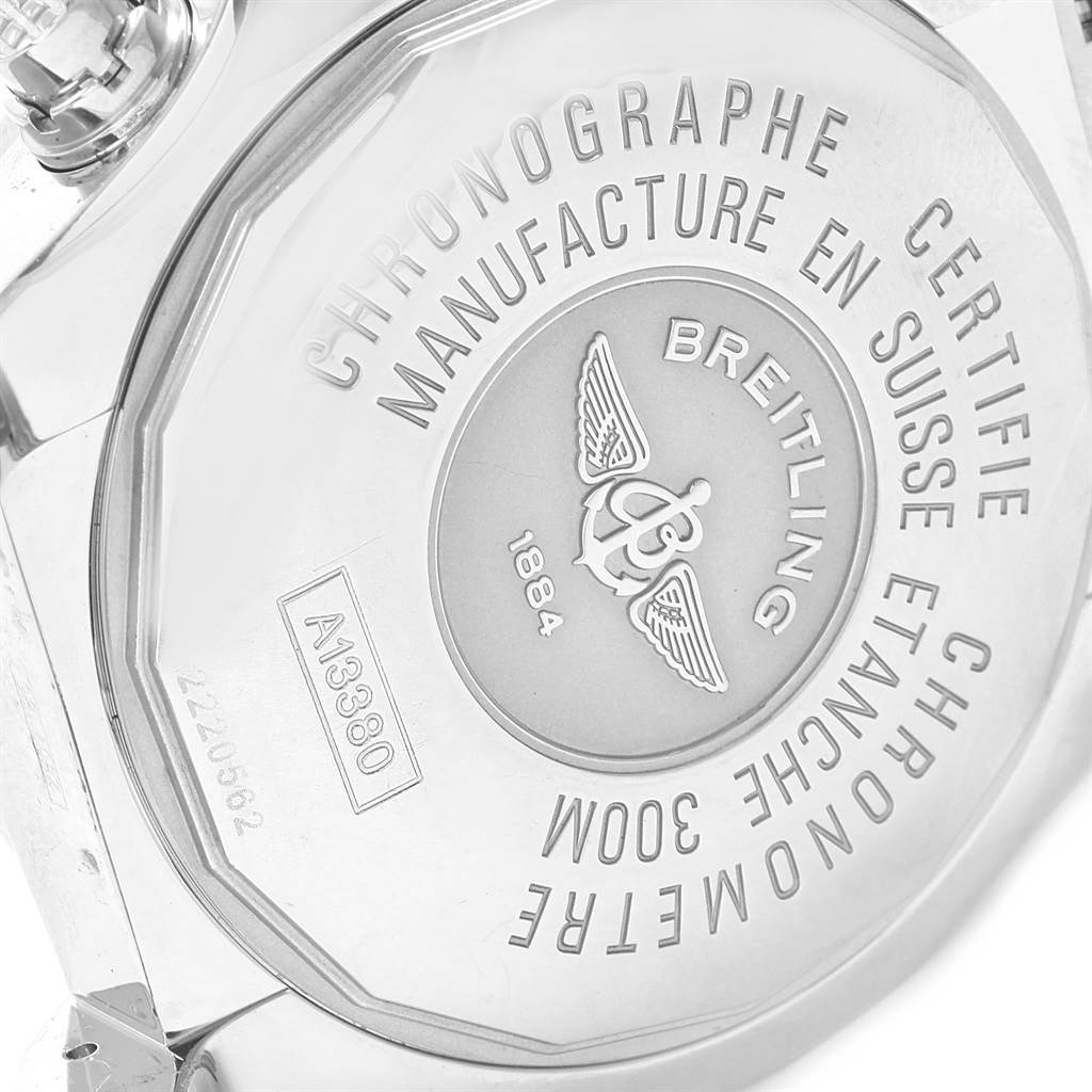 The image shows the back case of a Breitling Avenger A13380 Men's Stainless Steel Black Dial A13380 Men's Stainless Steel Black Dial watch, highlighting certification details and the brand's emblem.