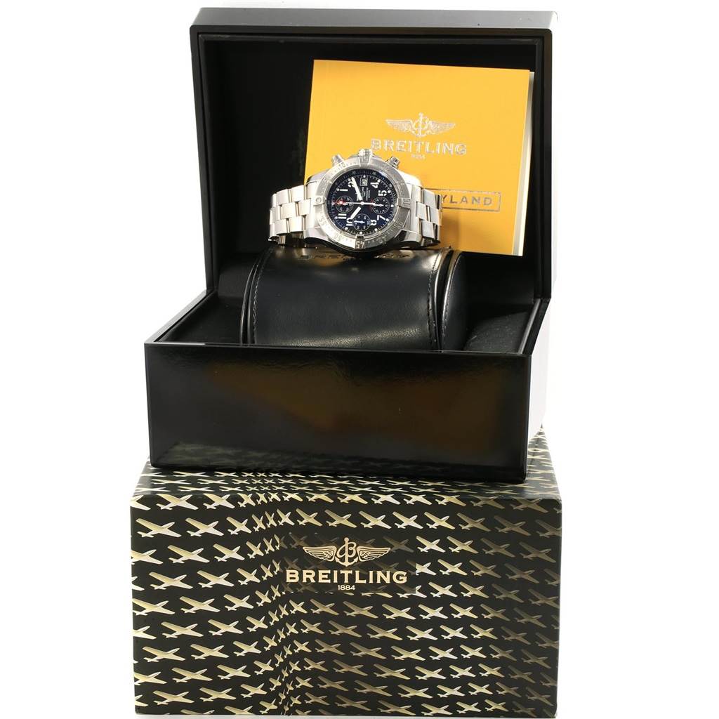 The Breitling Avenger A13380 Men's Stainless Steel Black Dial A13380 Men's Stainless Steel Black Dial watch is displayed head-on in its opened box with branded packaging and documentation visible.