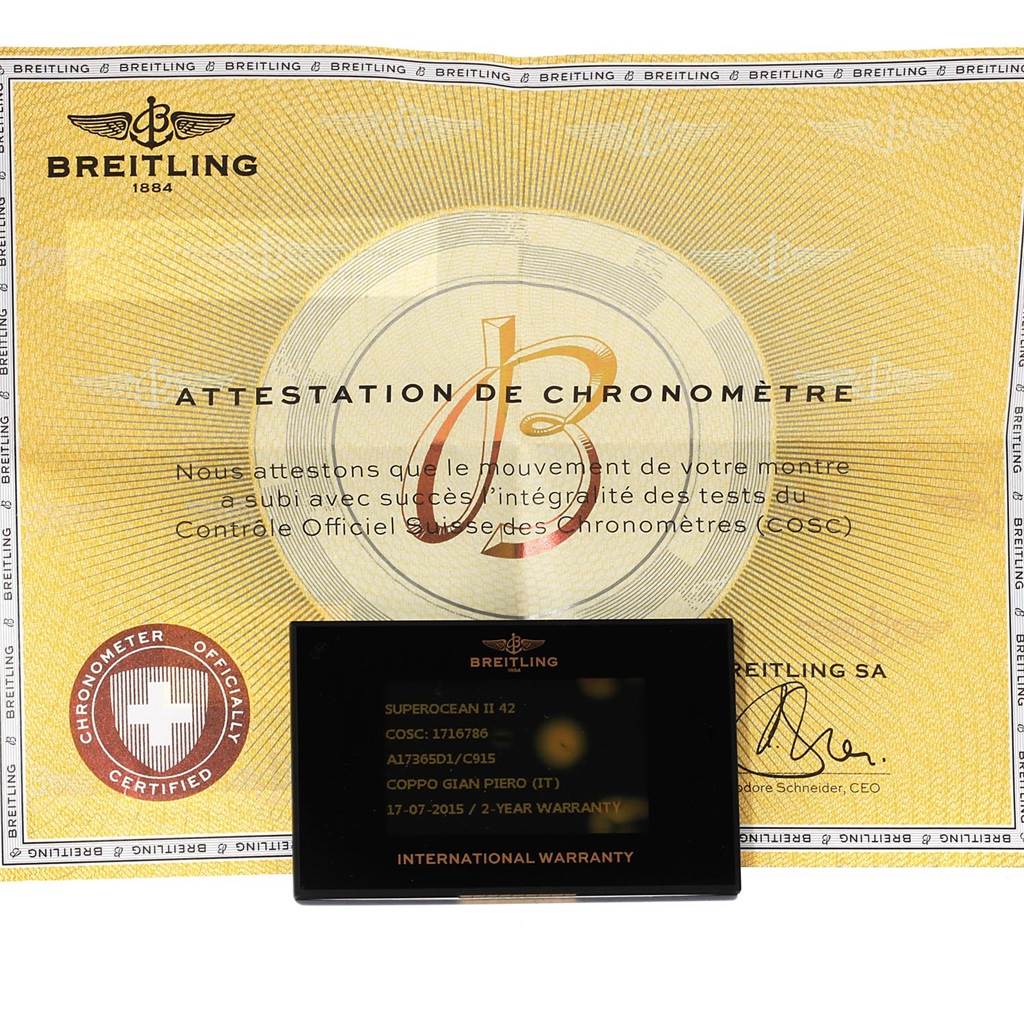 The image shows a Breitling Superocean A17365 Men's Stainless Steel Blue Dial A17365 Men's Stainless Steel Blue Dial model’s chronometer certificate and warranty card.