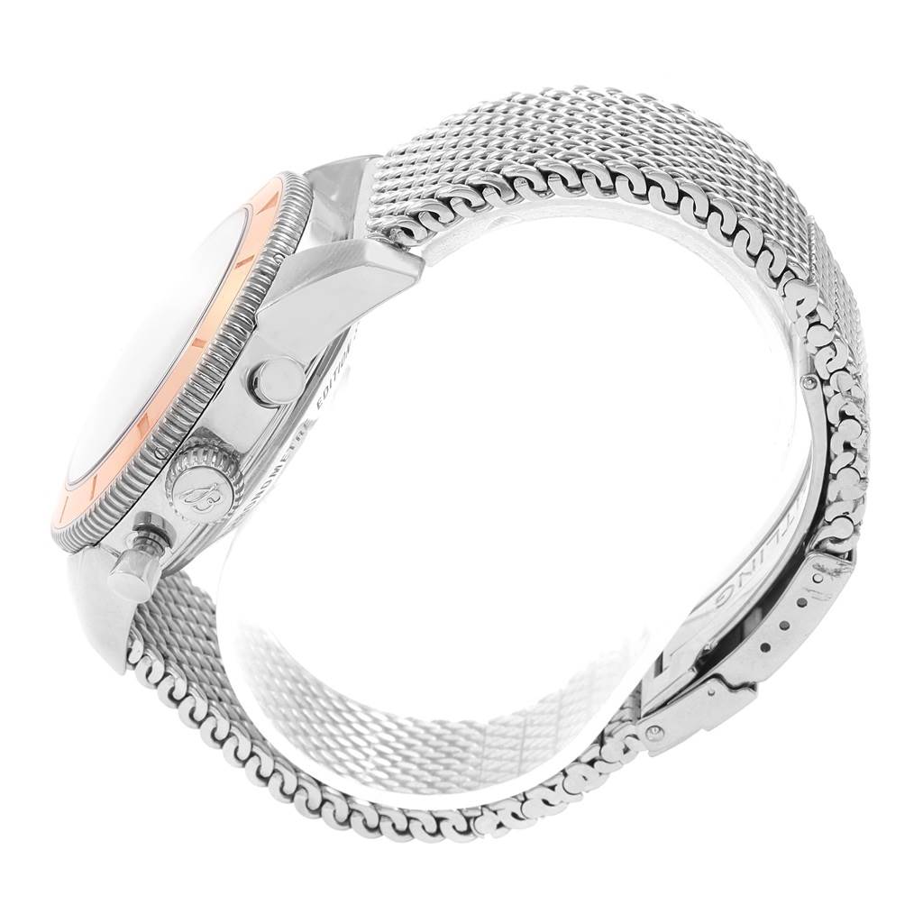 The image shows a side view of the Breitling Superocean U2337012-BB81 Men's Stainless Steel Black Dial U2337012-BB81 Men's Stainless Steel Black Dial watch, highlighting the case, crown, and mesh bracelet.