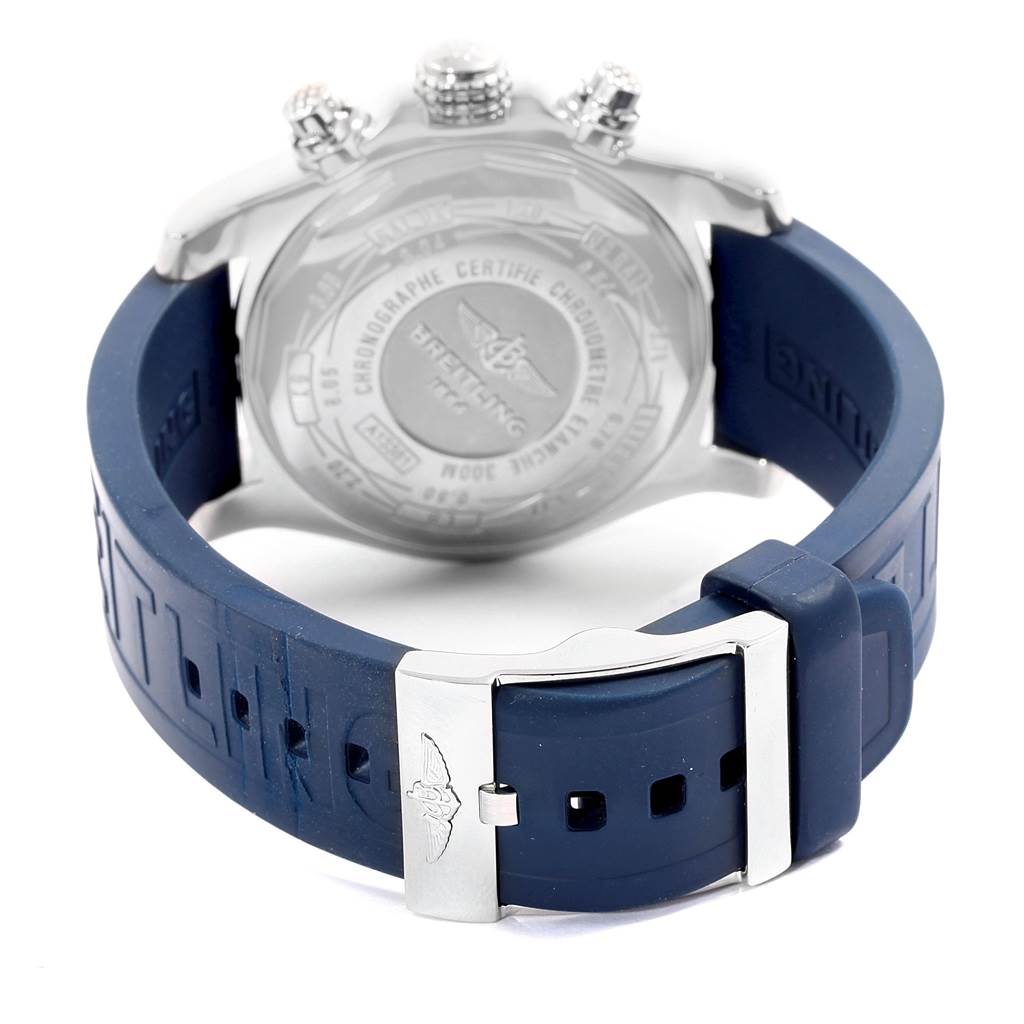 The image shows the back view of a Breitling Avenger A13381 Men's Stainless Steel Blue Dial A13381 Men's Stainless Steel Blue Dial watch, focusing on the case back and blue strap with a buckle clasp.