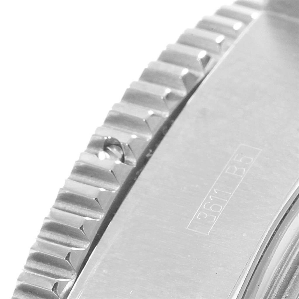 This image shows a close-up of the bezel and part of the case of a Breitling Superocean A13341 Men's Stainless Steel Black Dial A13341 Men's Stainless Steel Black Dial watch.