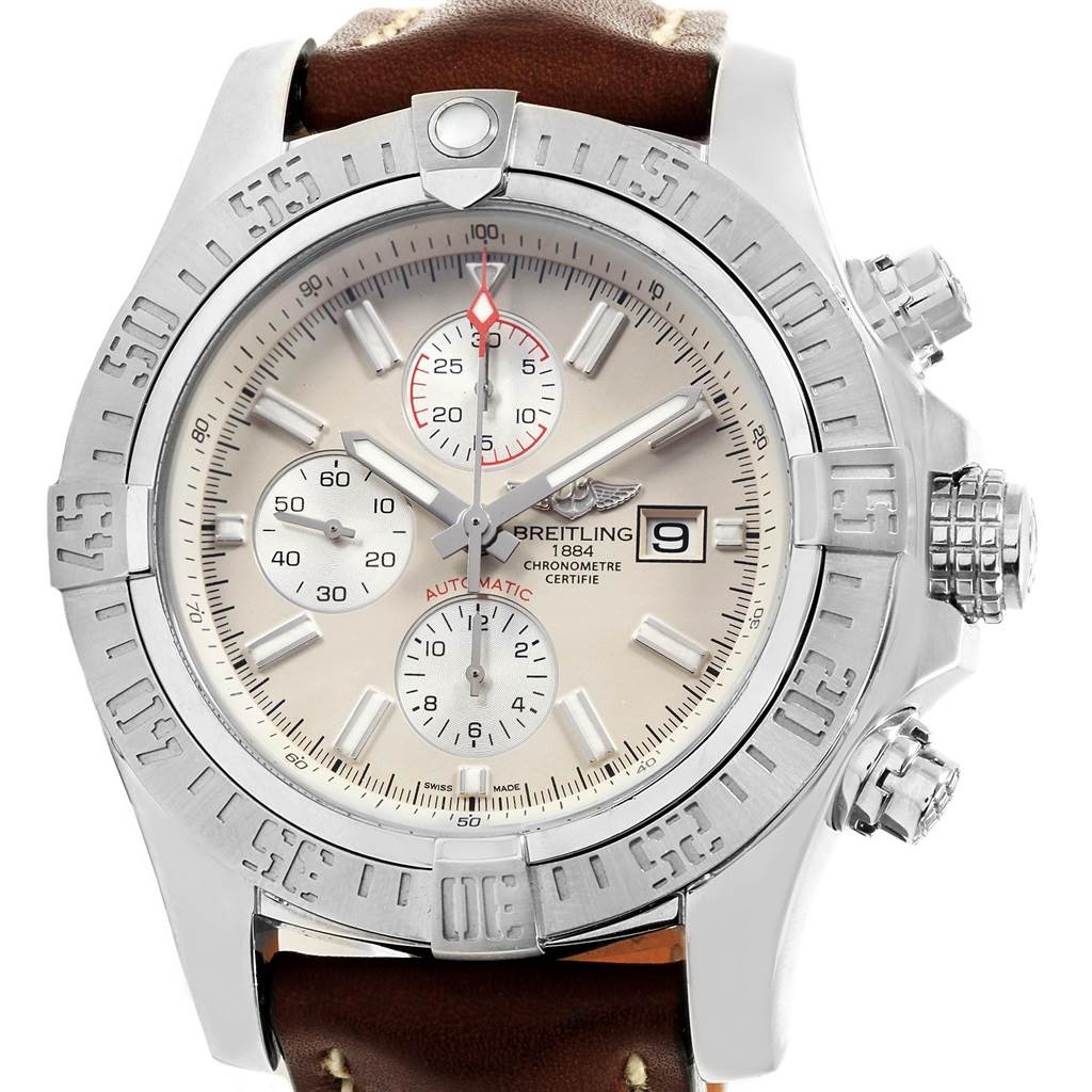 The image shows a front view of the Breitling Avenger A13371 Men's Stainless Steel Beige Dial A13371 Men's Stainless Steel Beige Dial watch, highlighting its dial, bezel, chronograph buttons, and brown leather strap.