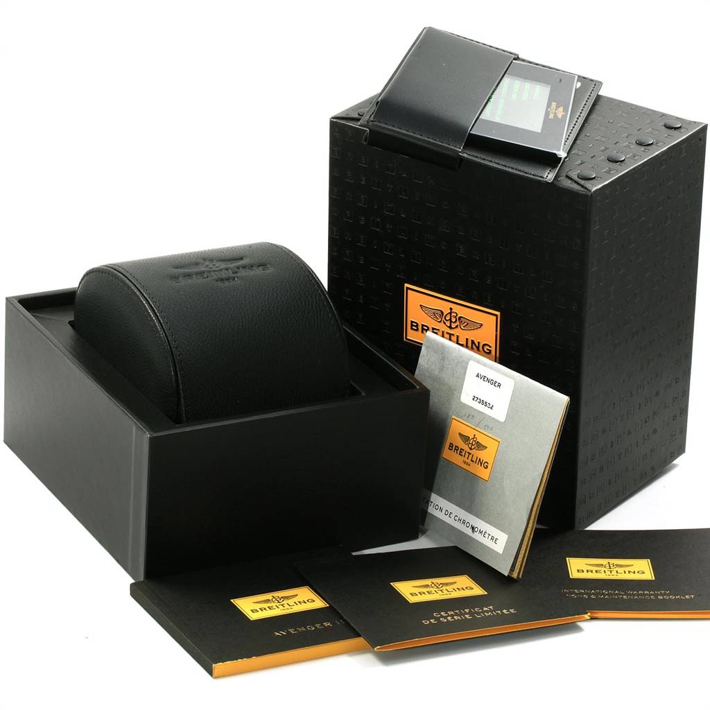 The image shows the Breitling Avenger A13381 Men's Stainless Steel White Dial A13381 Men's Stainless Steel White Dial watch box, manuals, warranty card, and packaging from the front angle.