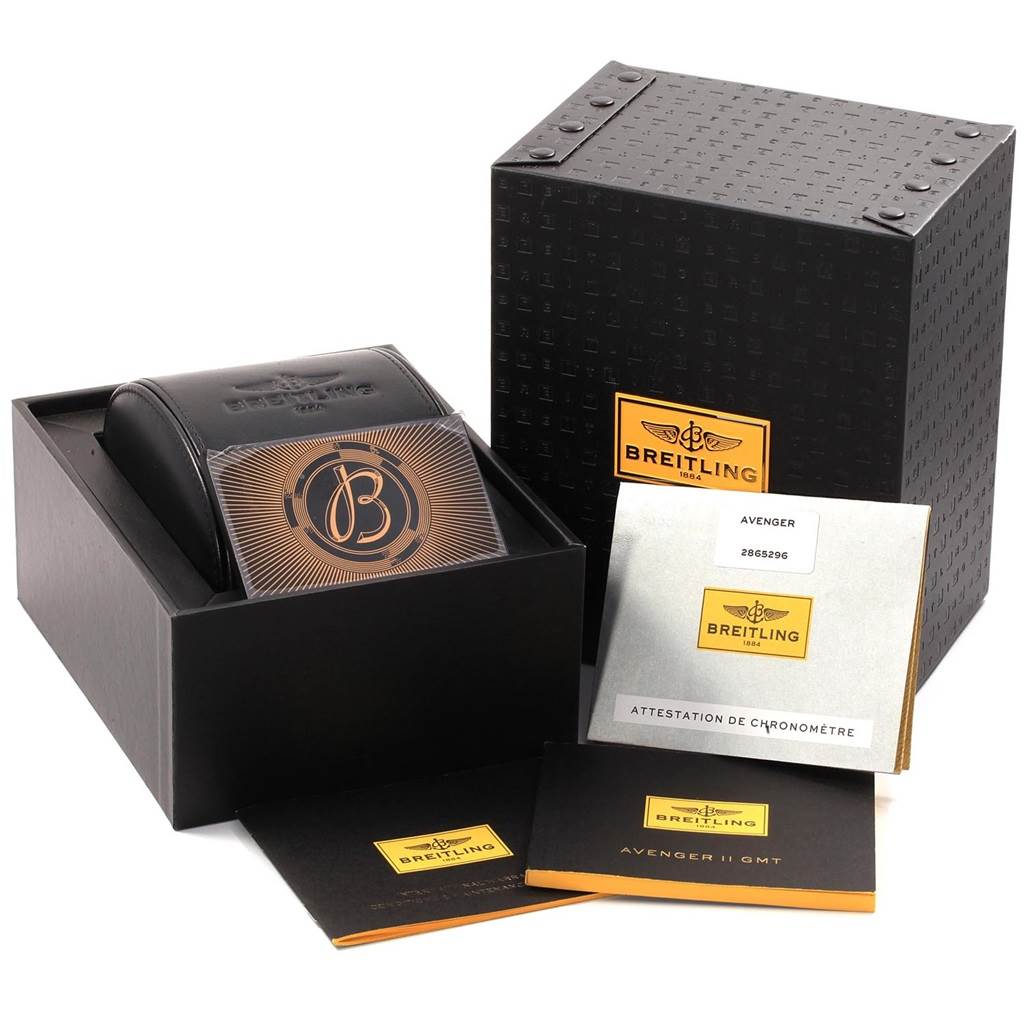 The image shows the packaging and accessories for a Breitling Avenger A32390 Men's Stainless Steel Black Dial A32390 Men's Stainless Steel Black Dial watch, including boxes and certificates.