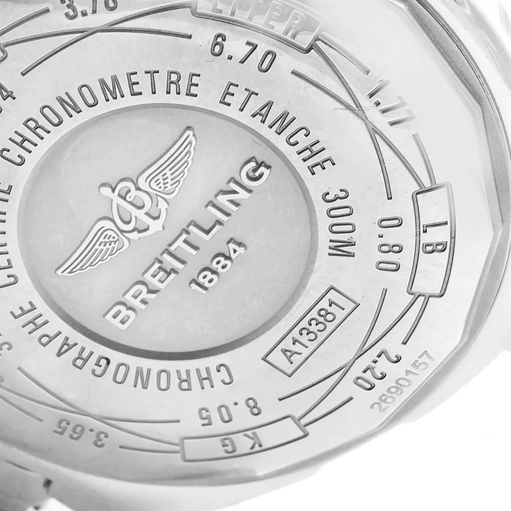 The image shows the engraved case back of a Breitling Avenger A13381 Men's Stainless Steel Black Dial A13381 Men's Stainless Steel Black Dial watch, displaying specifications and the brand logo.