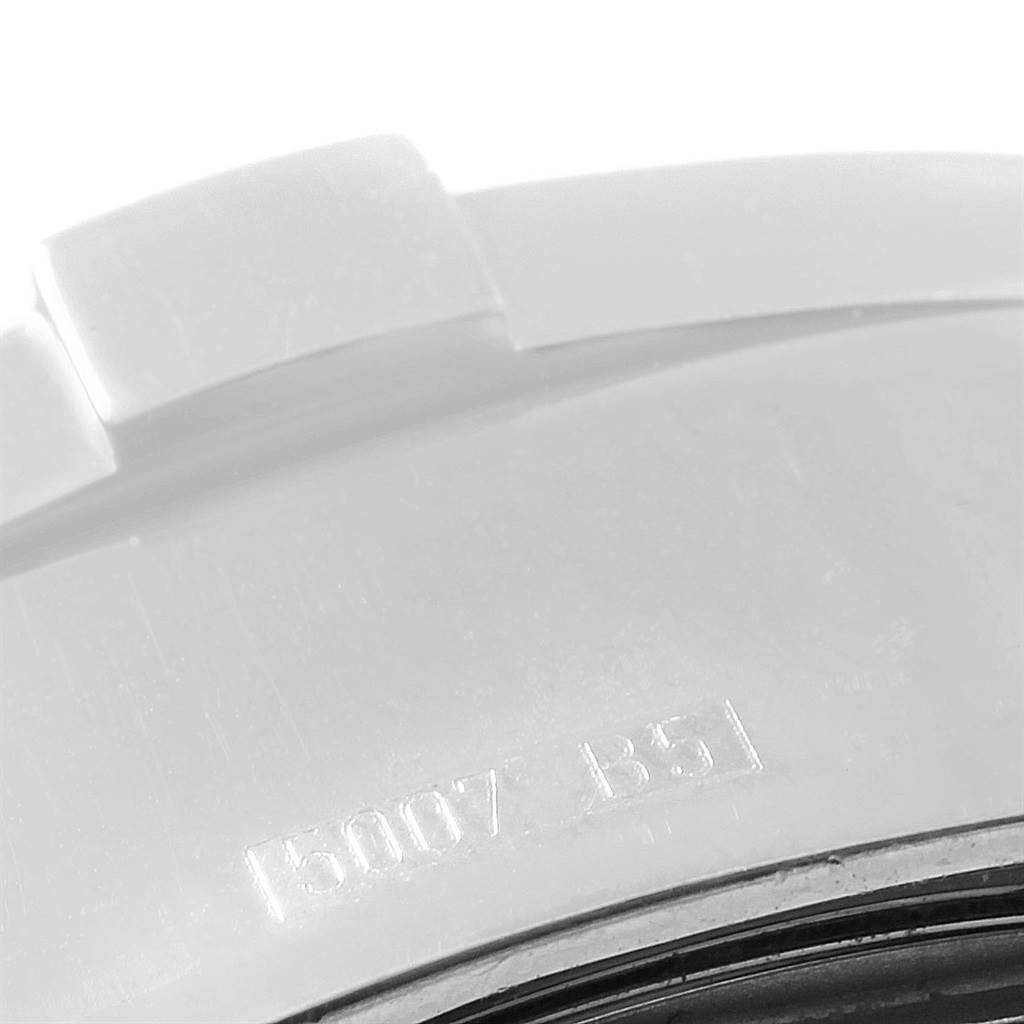 The image shows a close-up of the outer case and bezel of the Breitling Superocean A13340 Men's Stainless Steel Beige Dial A13340 Men's Stainless Steel Beige Dial watch, highlighting the serial number engraving.
