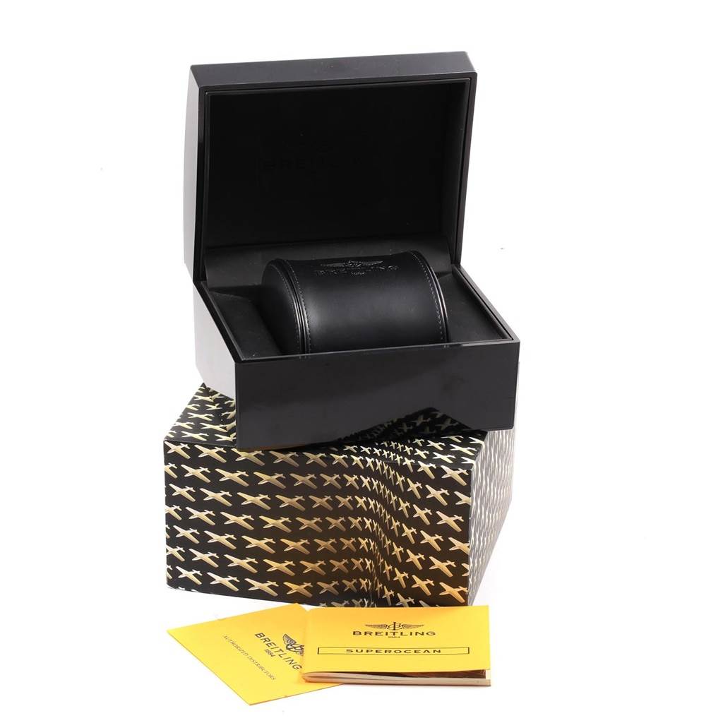 The image shows the packaging and accessories for a Breitling Superocean A13340 Men's Stainless Steel Beige Dial A13340 Men's Stainless Steel Beige Dial watch, including the box, case, and manuals.