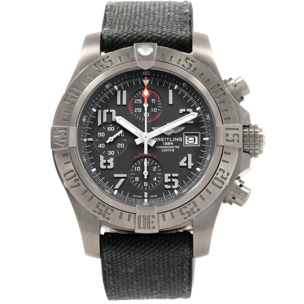 The image shows a front view of a Breitling Avenger E13383 Men's Titanium Grey Dial E13383 Men's Titanium Grey Dial watch, highlighting its dial, bezel, chronograph subdials, and fabric strap.