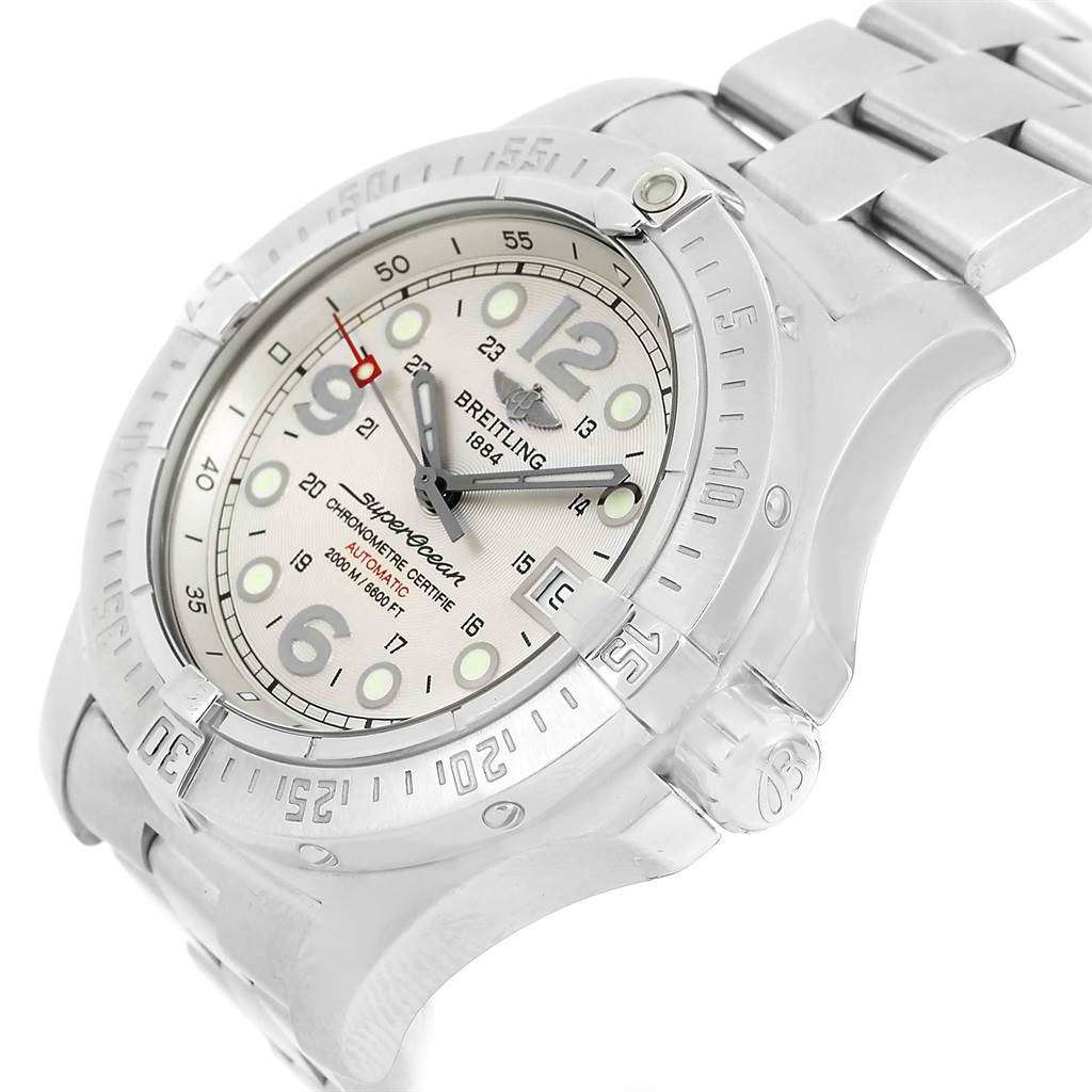 The image shows a side-angled view of a Breitling Superocean A17390 Men's Stainless Steel Silver Dial A17390 Men's Stainless Steel Silver Dial watch, detailing the dial, bezel, and part of the bracelet.