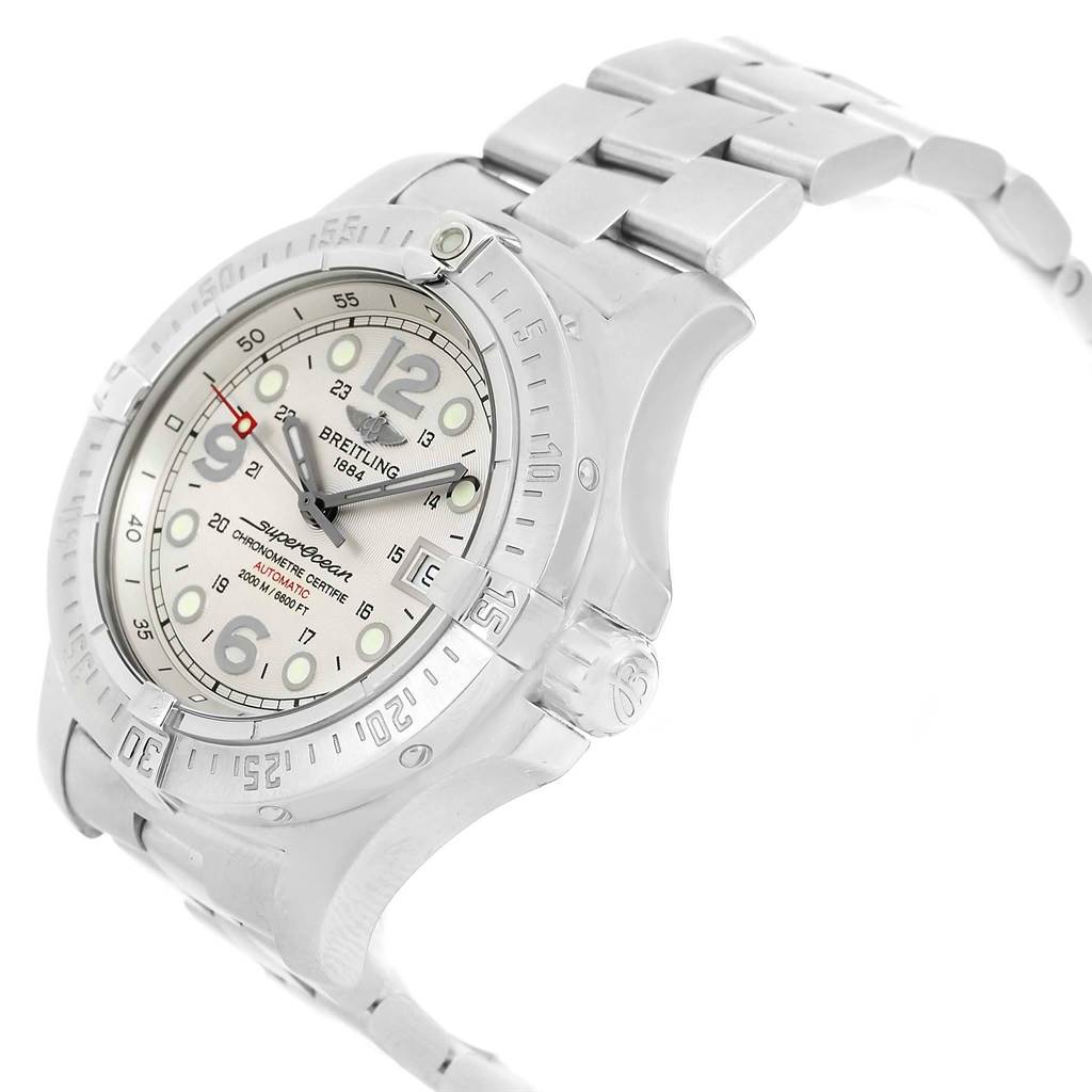 The image shows a side angle of the Breitling Superocean A17390 Men's Stainless Steel Silver Dial A17390 Men's Stainless Steel Silver Dial watch, highlighting its bezel, dial, and metal bracelet.
