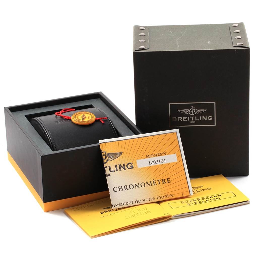 The image shows the packaging, case, and documents for a Breitling Superocean A17390 Men's Stainless Steel Silver Dial A17390 Men's Stainless Steel Silver Dial watch.