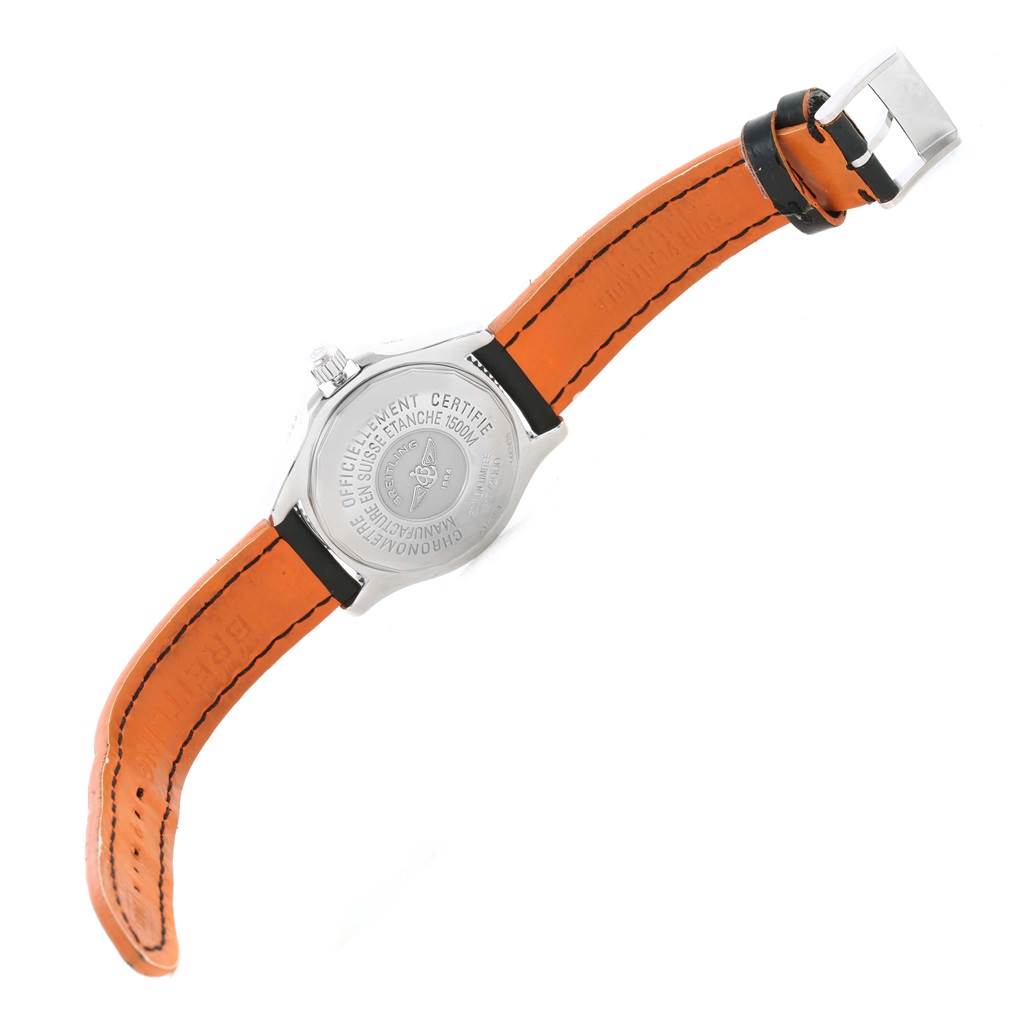 The image shows the back case and orange strap of the Breitling Superocean A17364 Men's Stainless Steel Black Dial A17364 Men's Stainless Steel Black Dial watch at an angle.