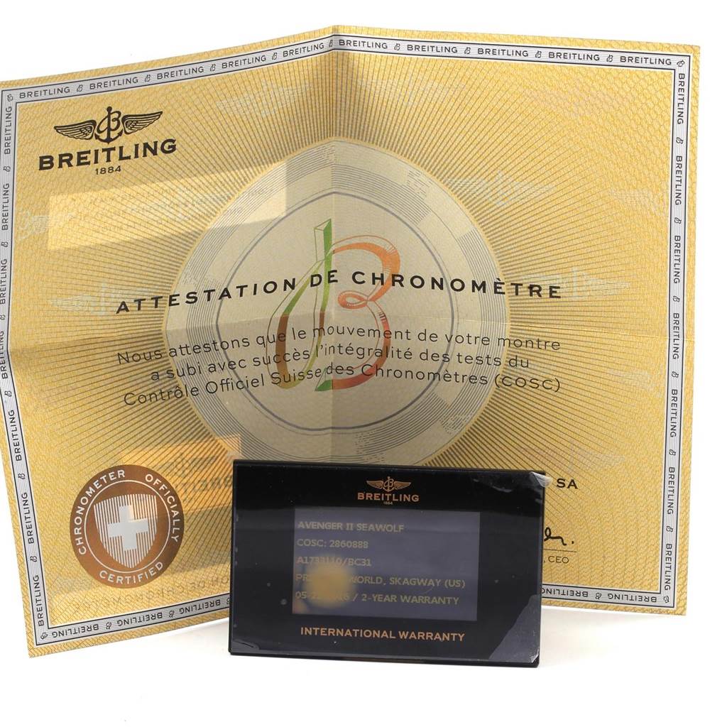 The image shows the Breitling Avenger A17331 Men's Stainless Steel Black Dial A17331 Men's Stainless Steel Black Dial model's chronometer certification and international warranty card.