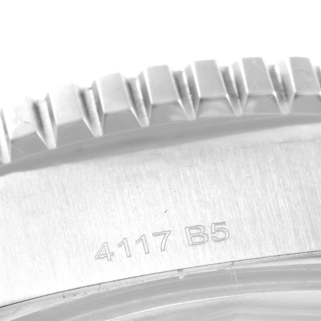This close-up photo shows the engraved case and bezel detail of a Breitling Superocean A17392D8/C910 Men's Stainless Steel Blue Dial A17392D8/C910 Men's Stainless Steel Blue Dial watch.
